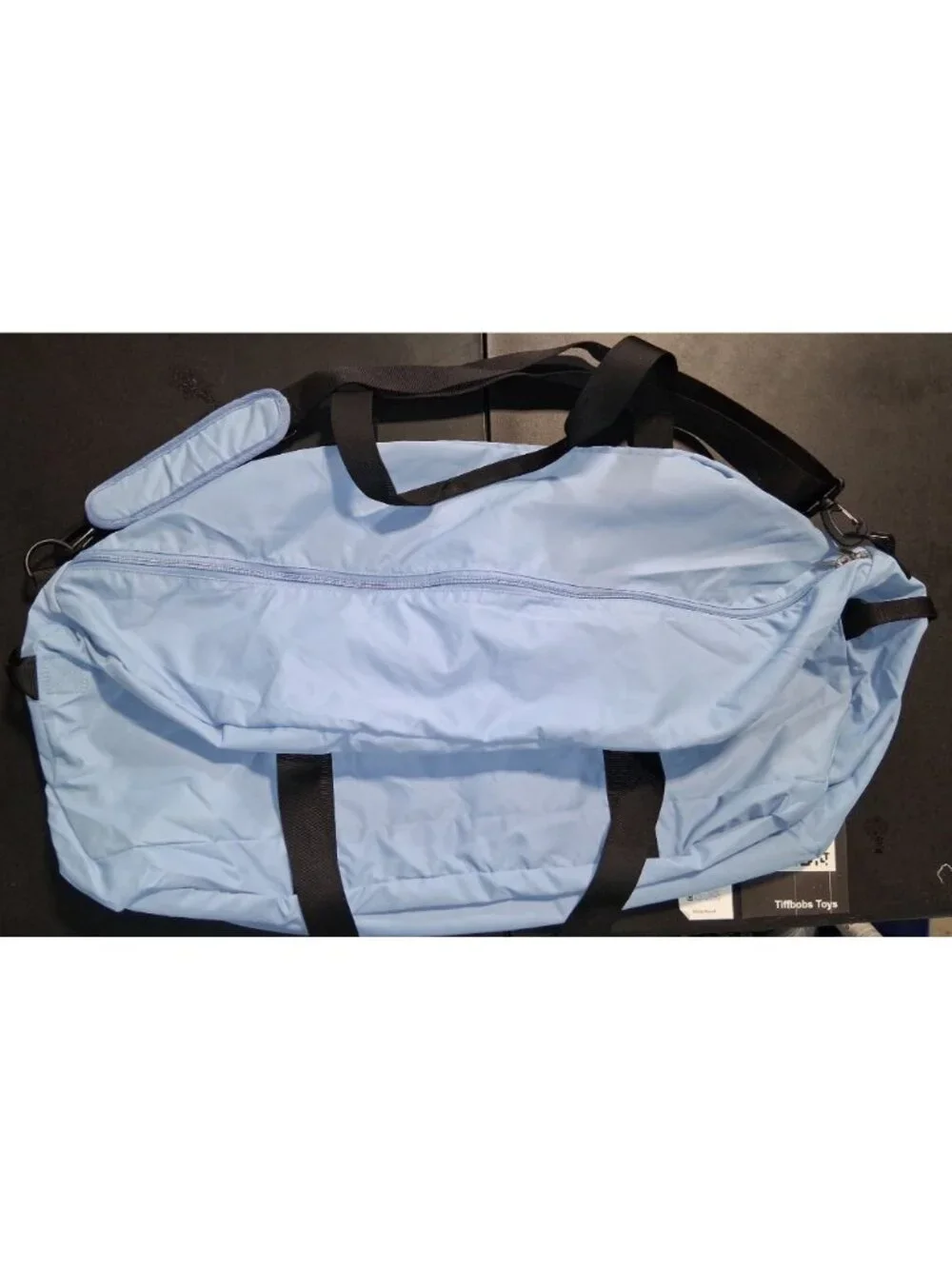 Light Blue Oversized Duffel Bag With Black Straps & Detachable Shoulder Strap